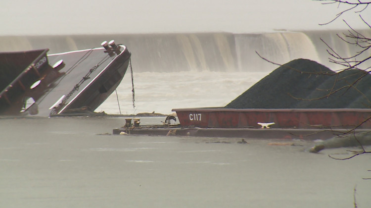 Two barges near the McAlpine Lock and Dam, close to Indiana's Falls of the Ohio State Park in southern Indiana. - (Steve Burns/WTIU)