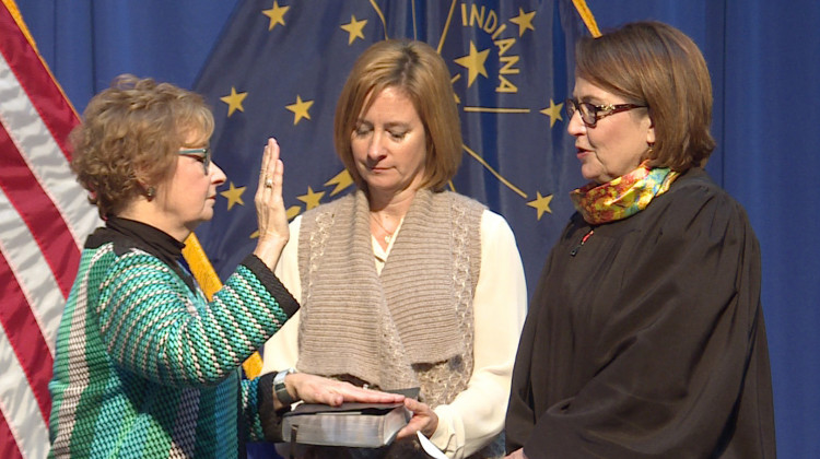 Chief Justice Loretta Rush swears in Secretary of State Connie Lawson. Lawson has served in the position since March 2012. - Lauren Chapman/IPB News