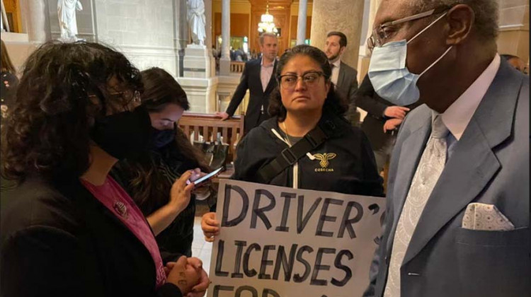 Immigrant rights advocates went to the Statehouse Tuesday to demand lawmakers reverse a policy that bars undocumented immigrants from getting a driver’s license. - Sydney Dauphinais/WFYI
