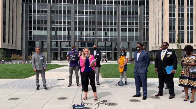 Representatives from Faith in Indiana gathered at the City-Council Building in Indianapolis Monday to voice support for a new proposal that would update governance of the city's police department.  - Robert Moscato-Goodpaster/WFYI