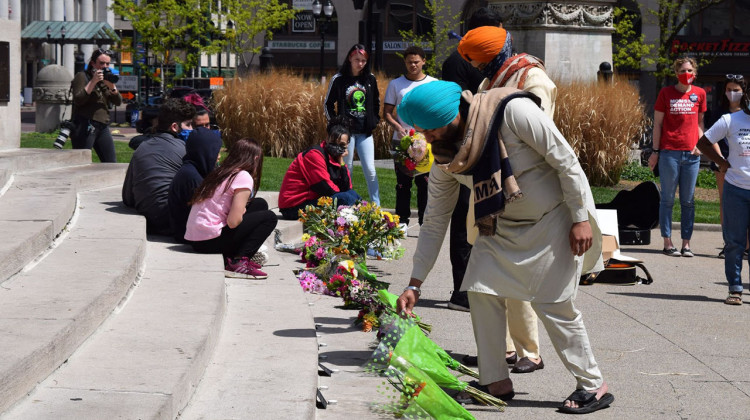 A crowd of about 200 people gathered Sunday afternoon at Monument Circle to honor the lives of the eight individuals who died in Indianapolis' latest mass shooting. - Pria Mahadevan/WFYI