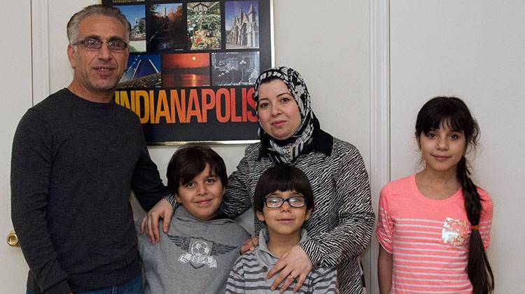 Fadi Lababidi with his wife Waed Alhamoud and three of their four children 9-year-old Mohammed, 7-year old Hamzeh and 11-year-old Salemah. - Doug Jaggers