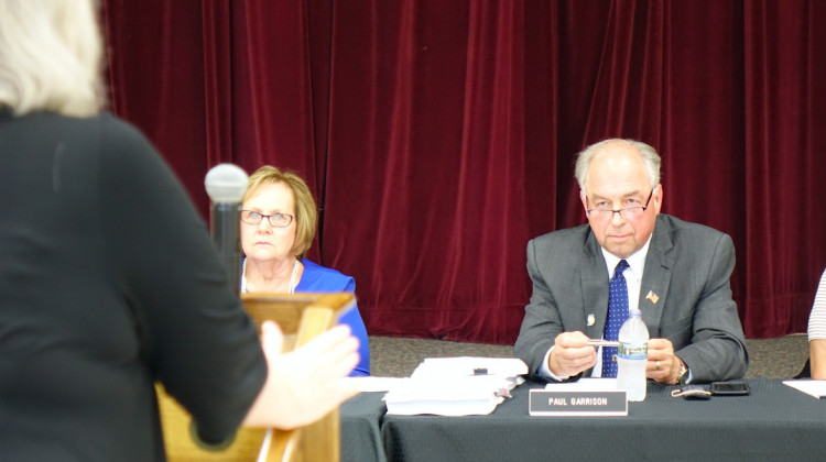 Daleville Community School's Board President Diane Evans, left, and Superintendent Paul Garrison listen to Indiana Virtual School attorney Mary Jane Lapointe during a meeting Monday, Aug. 19, 2019 at the Daleville high school. - Eric Weddle/WFYI