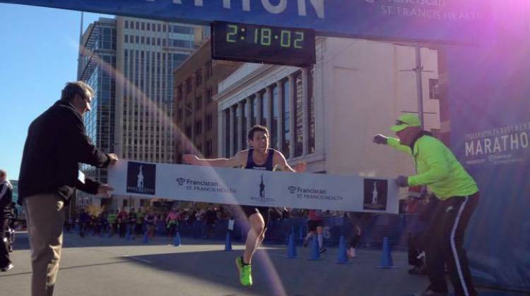 Jesse Davis crosses the finish line at the Monumental Marathon Saturday. - Monumental Marathon