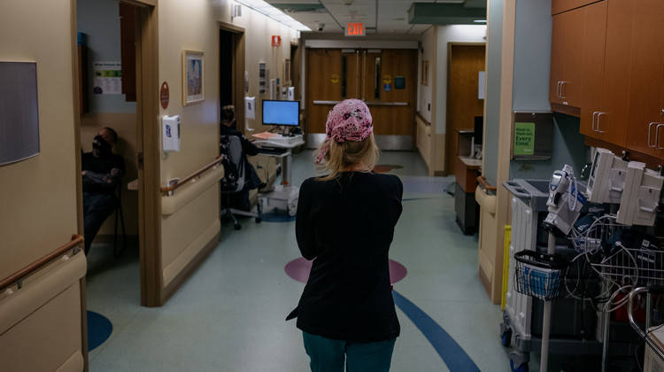 JJ Brandt, a registered nurse at the Sparrow Hospital Pediatric Emergency Department in Lansing, is trained to help mend broken bones and childhood ailments. But Brandt now spends more time keeping watch over children with mental health issues as they wait for treatment that can take days or weeks. - (Erin Kirkland/Bridge Michigan)