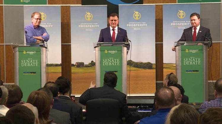 Former state lawmaker Mike Braun, U.S. Rep. Luke Messer and U.S. Rep. Todd Rokita participate in a debate sponsored by by conservative group Americans for Prosperity-Indiana.  - Barbara Brosher/WTIU