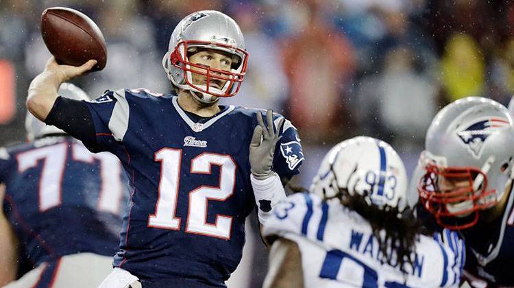 The judge presiding over the "Deflategate" legal case says there is no deal, but talks continue in an effort to settle a dispute over a four-game suspension of New England quarterback Tom Brady. - AP Photo/Charles Krupa, File