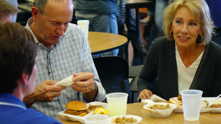 DeVos Visits Charter Schools, Hog Roast On Indiana Tour