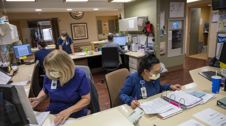 Staff work at a recovery unit at UnityPoint's Methodist hospital in Des Moines. The unit receives many COVID-19 patients recovering from the virus. - (Natalie Krebs/Side Effects Public Media)