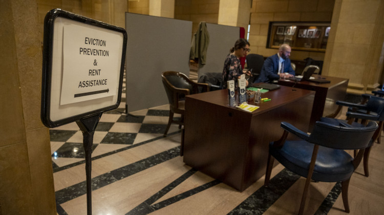 Iowa Legal Aid employees work at the Linn County Eviction Diversion Help Desk, which provides free legal assistance to residents facing eviction. - Natalie Krebs / Side Effects Public Media