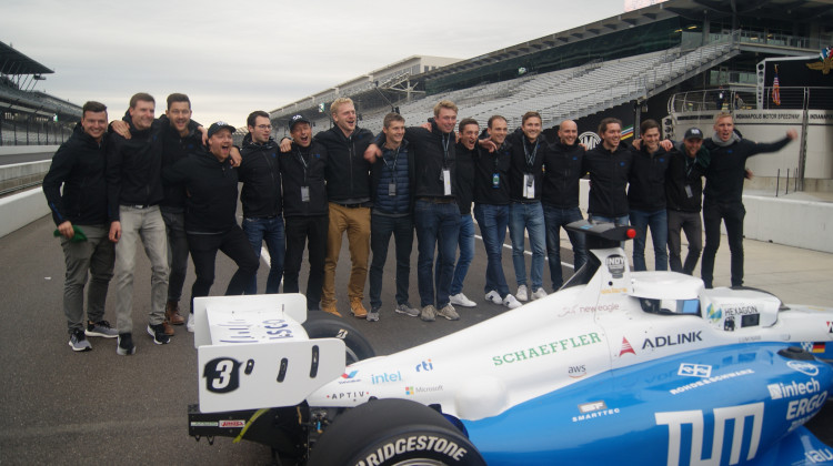 The TUM Autonomous Motorsport team celebrates along the yard of bricks at the Indianapolis Motor Speedway after winning the Indy Autonomous challenge. - Samantha Horton/IPB News