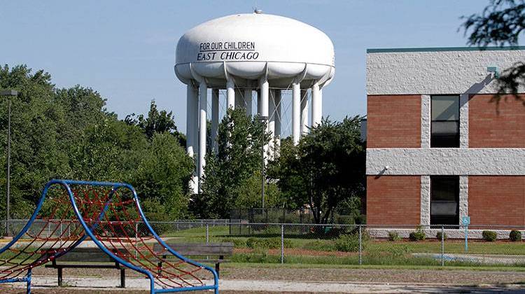 This Aug. 23, 2016 photo shows an empty playground and Carrie Gosch elementary school which has been closed due to lead contamination near the West Calumet Housing Complex in East Chicago, Ind. - AP Photo/Tae-Gyun Kim