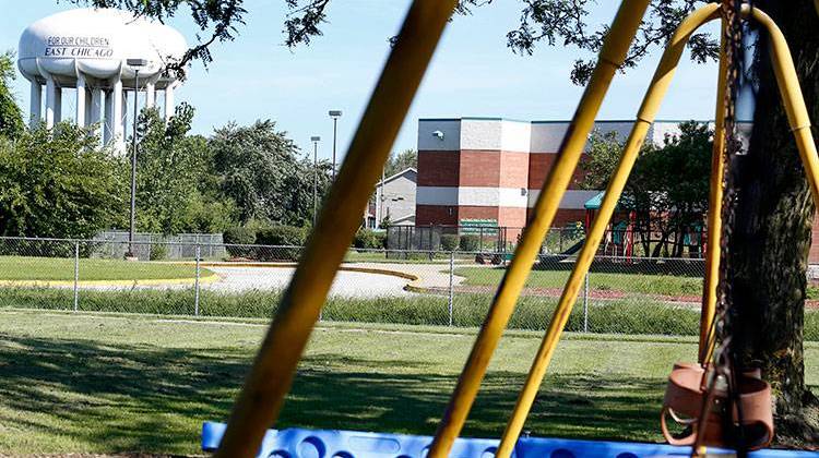 This Aug. 23, 2016 photo shows an empty playground near the West Calumet Housing Complex in East Chicago, Ind. The EPA has detected high levels of lead in samples of dust and dirt tracked inside homes where soil is tainted with industrial contaminants. - AP Photo/Tae-Gyun Kim