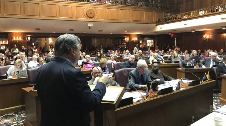 Rep. Jerry Torr (R-Carmel), author of the redistricting reform bill, presents it to the Elections Committee in a packed House Chamber. - Brandon Smith/IPB
