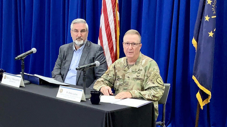 Gov. Eric Holcomb and Brig. Gen. Dale Lyles, head of the Indiana National Guard, discuss details of Afghan evacuees coming to Camp Atterbury. - Brandon Smith/IPB News