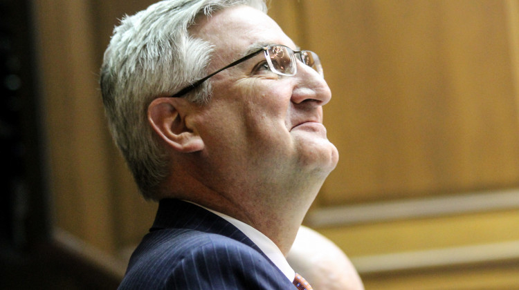 Gov. Eric Holcomb urged businesses, bars, restaurants and individuals to exercise caution, even as he lifts capacity limits. - Lauren Chapman/IPB News
