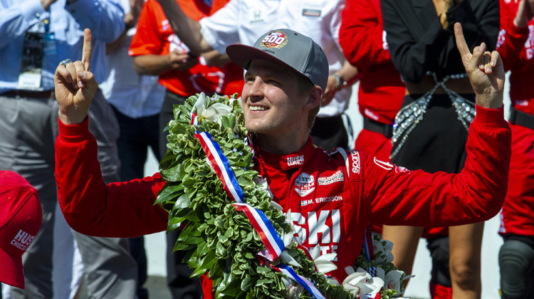 Marcus Ericsson celebrates his Indianapolis 500 win at the Yard of Bricks on SUnday, May 29, 2022. - Doug Jaggers/WFYI