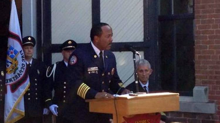 Ernest Malone at the podium during the announcement that he will be chief of IFD. - Sam Klemet