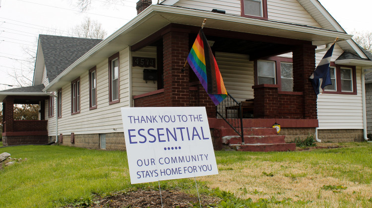 Signs like this one have popped up across Indianapolis. It reads: "Thank you to the essential. Our community stays home for you." - Lauren Chapman/IPB News