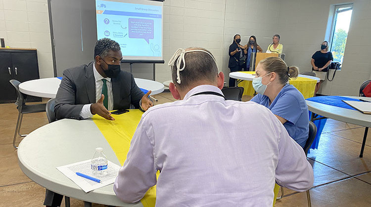 Indianapolis Public Schools Board of Commissioners President Evan Hawkins speaks to community members at an IPS community conversation at The Burrello Family Center on Monday, Sept. 27, 2021.  - (Elizabeth Gabriel)