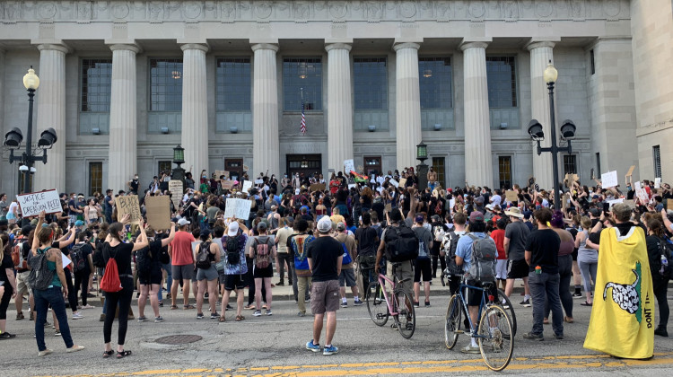 Protesters gathered in front of Central Library Wednesday, June 3 before marching through Indianapolis to Monument Circle. - Jill Sheridan/WFYI
