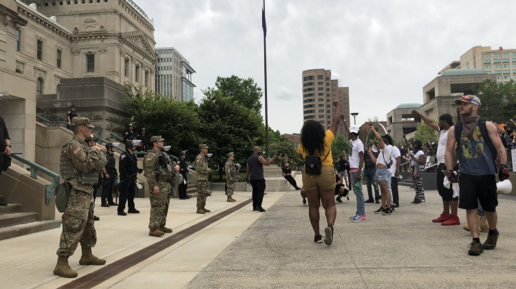 Peaceful protesters outside of the Indiana Statehouse Thursday evening. - Carter Barrett