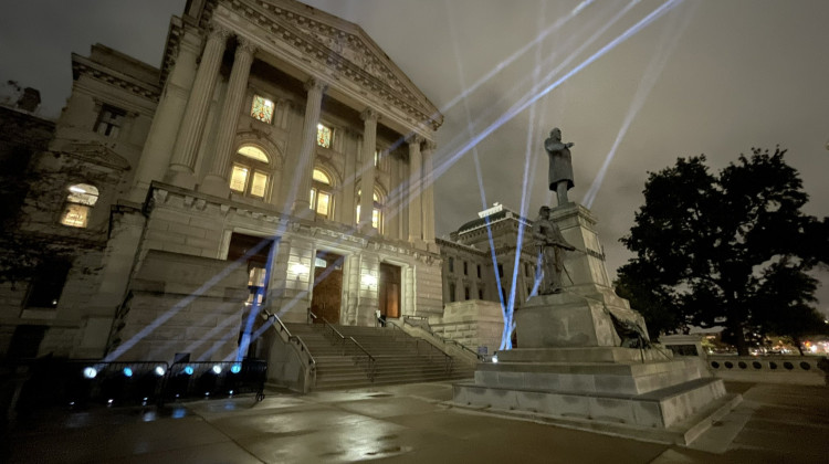 Blue and white spotlights, the colors of the Israel flag, illuminate the night sky at the Indiana Statehouse on Monday.  - Courtesy of Zach Myers at FOX59/CBS4