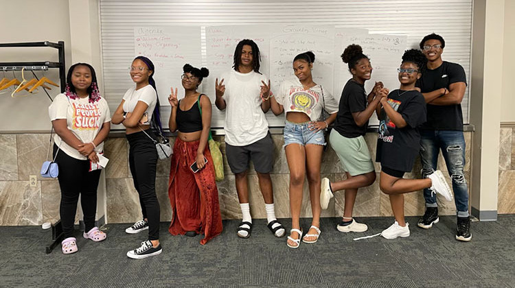 Faith In Indiana started the Black Youth Collective in 2022. Georon Evans, 20, far right, and Londen, 15, second from left, stand with their other fellows at the Indiana Interchurch Center in July. - Faith In Indiana