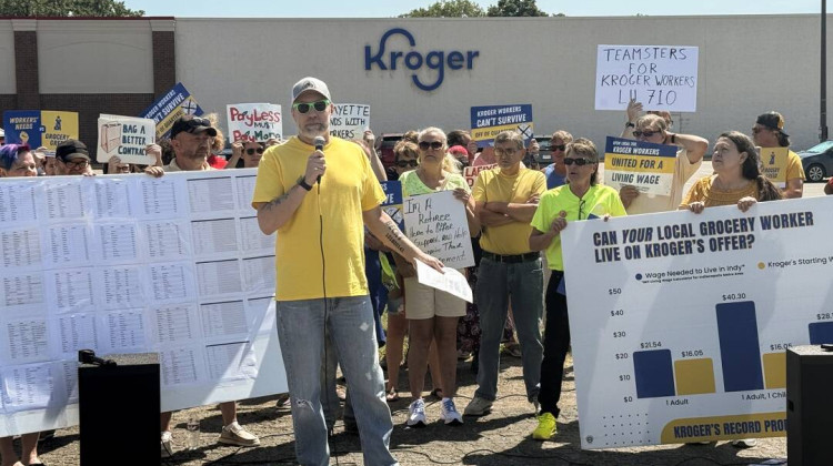 The grocery retailer offered a $0.90 pay increase over three years for starting pay and a $200 Kroger gift card — which angered some members of UFCW Local 700. Some workers said Kroger set up a food pantry in their break room because employees can't afford to shop where they work. - Timoria Cuningham / IPB News