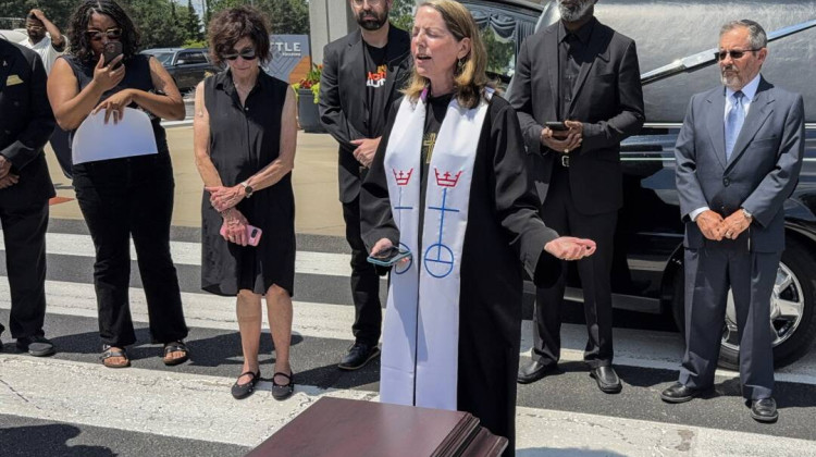 Faith leaders protest federal tax, spending cut bill outside U.S. Sen. Todd Young's office
