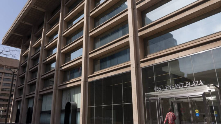 On Tuesday, a federal judge issued a preliminary injunction on President Trump's attempt to dismantle the Institute of Museum and Library Services. Above, the building that houses the offices of the IMLS in Washington, D.C. - Jacquelyn Martin / AP