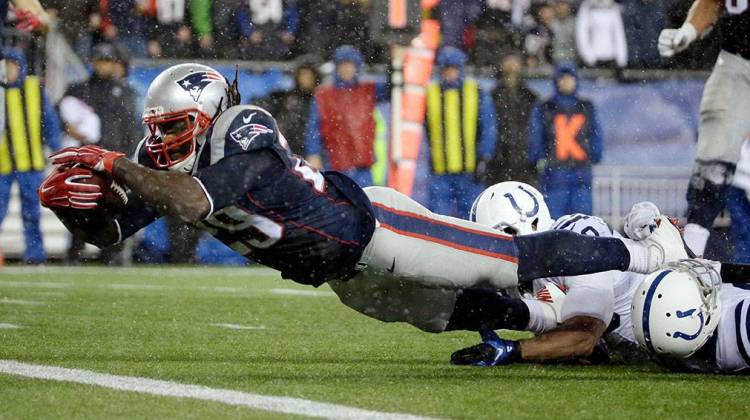 The football seen here, as New England running back LeGarrette Blount scores a touchdown in the AFC Championship game, is for sale. - AP Photo/Matt Slocum