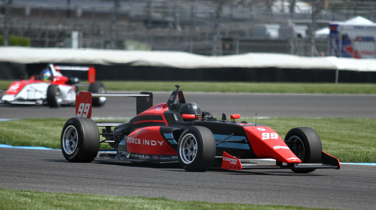 Force Indy driver Myles Rowe competes in the No. 99 car at the Indianapolis Motor Speedway.  - Doug Jaggers/WFYI