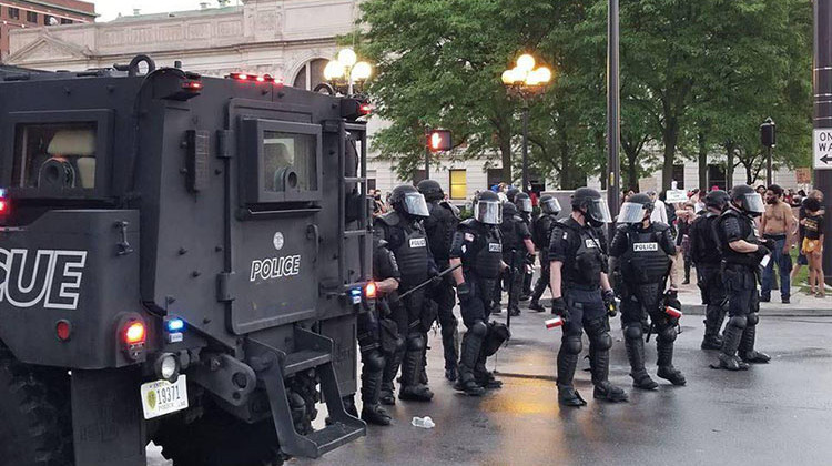 Police square off with protesters Friday evening in downtown Fort Wayne. - Provided by Jeremiah Miser