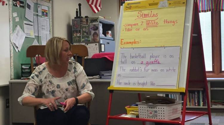 Frankfort teacher Anne Lanum works with English learner students. - Claire McInerny/Indiana Public Broadcasting