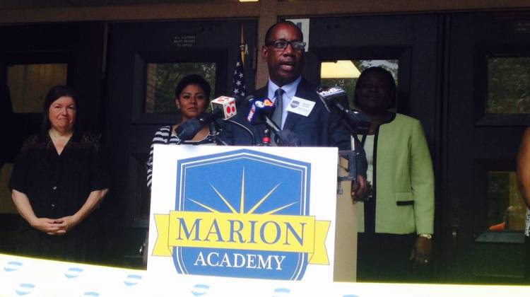 Emmitt Carney, Marion Academy school director, dedicates the new school at the former IPS School #68. - Eric Weddle / WFYI Public Media