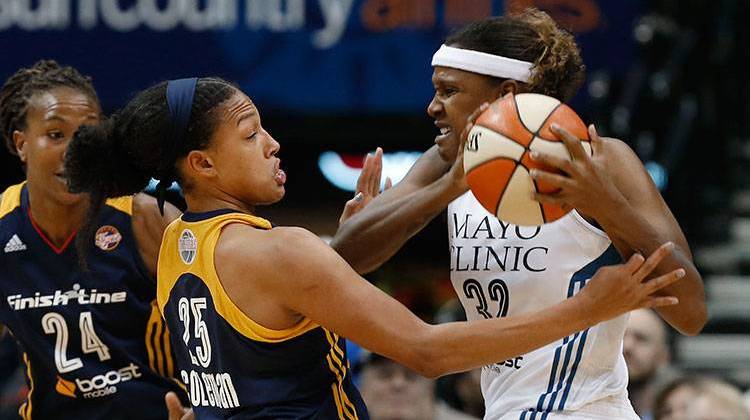 Minnesota Lynx forward Rebekkah Brunson, right, drives on Indiana Fever guard Marissa Coleman (25) in the first half of Game 2 of the WNBA basketball finals, Tuesday, Oct. 6, 2015, in Minneapolis. - AP Photo/Jim Mone