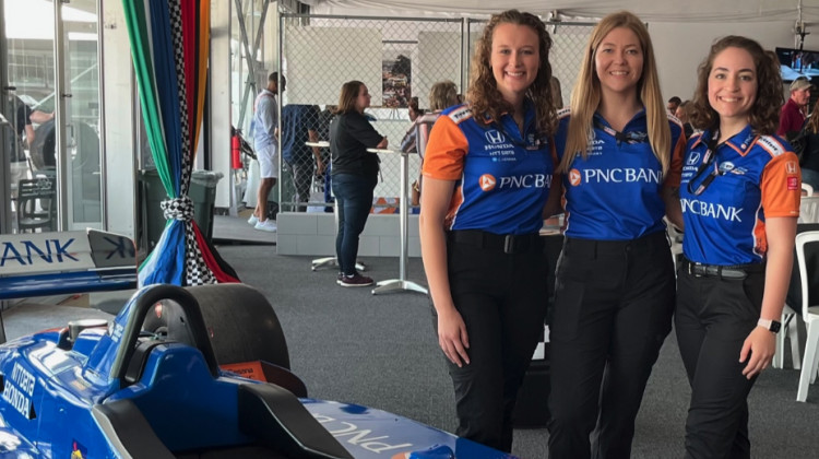 Interns Rebecca Hutton of IUPUI, Jennifer Short of Purdue University, and Kenna Edwards of Indiana University began their program this week at Chip Ganassi Racing. - Jill Sheridan/WFYI