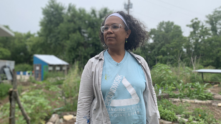 Phyllis Boyd, the executive director of Groundwork Indy, does not shy away from digging into the soil with her hands to teach the youth. She was a landscape architect and urban designer focused on sustainable design and planning. - (Farah Yousry/Side Effects Public Media)
