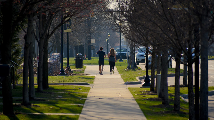 As Indiana state health officials encourage citizens to take walks, a couple walks through a park in Mishawaka.  - Justin Hicks/IPB News