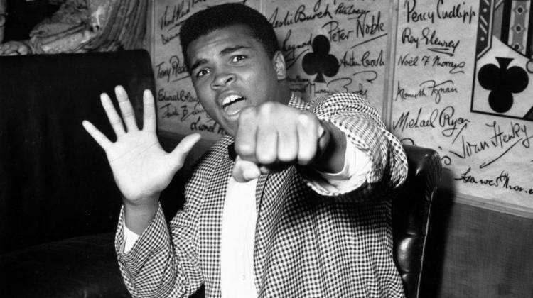 With a quick jab and even quicker gab, Muhammad Ali was a force to reckon with in the ring. Some of America's best sports writing has been devoted to the boxer, who's seen here in 1963.