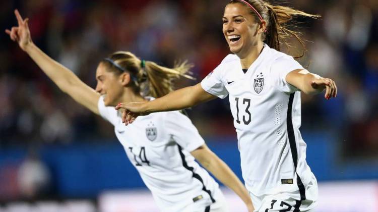 Alex Morgan of the U.S. women's soccer team celebrates a goal against Puerto Rico during the 2016 Women's Olympic Qualifying game on Feb. 10 in Frisco, Texas. The U.S. team will be going for its fourth straight gold, reflecting the dominance of American women at the Olympics, particularly in team sports.