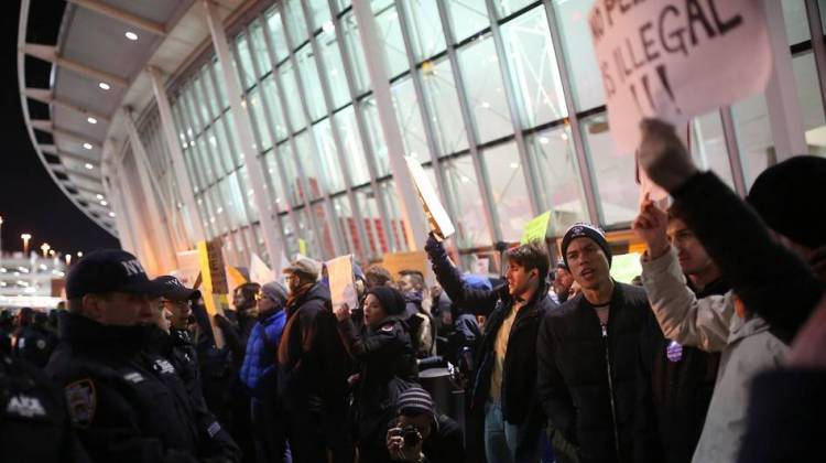 Activists stage a rally against President Donald Trump's 90-days ban of entry on 7 Muslim-majority countries at JFK airport in New York on Saturday. - Anadolu Agency/Getty Images