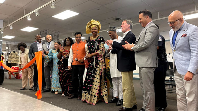 City and community leaders cut the ribbon to symbolize the grand opening of the Global Village Welcome Center. The all-day event was attended by hundreds of people celebrating and performing. - Sydney Dauphinais