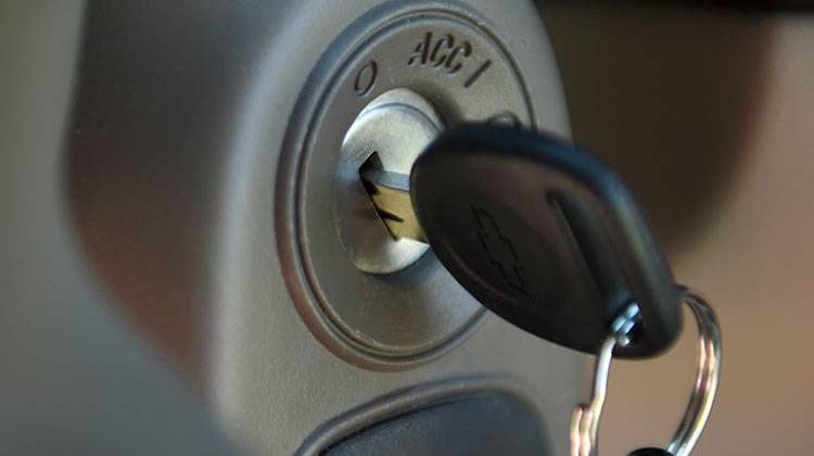 FILE - This Tuesday, April 1, 2014, file photo shows a key in the ignition switch of a 2005 Chevrolet Cobalt in Alexandria, Va. - AP Photo/Molly Riley, File