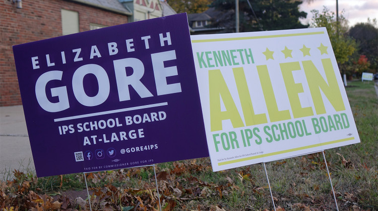 Campaign signs for two at-large candidates for the Indianapolis Public Schools Board of Commissioners near Shortridge High School on Sunday, Nov. 1, 2020. - Eric Weddle/WFYI News