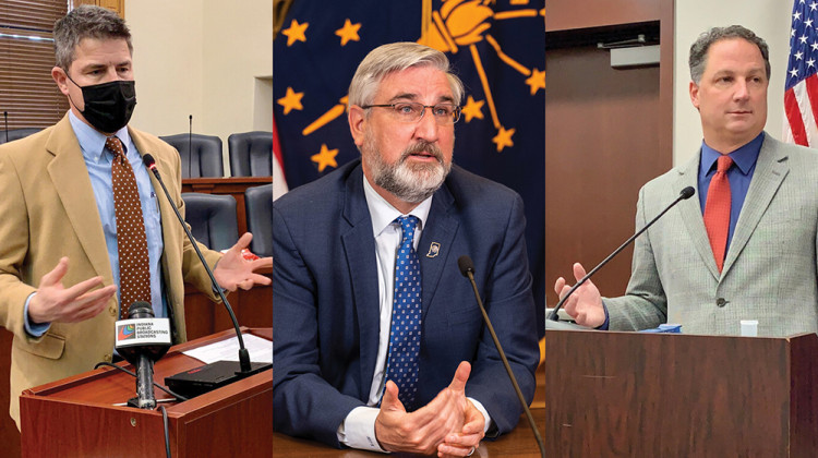 House Speaker Todd Huston (R-Fishers), right, said he and Senate President Pro Tem Rodric Bray (R-Martinsville), left, don't agree with Gov. Eric Holcomb, center, over the constitutionality of a bill allowing lawmakers to call a special session. - Brandon Smith/IPB News and Gov. Eric Holcomb's office