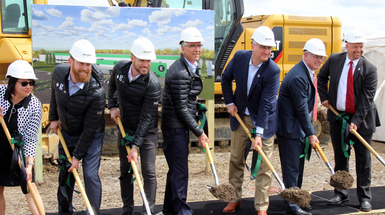 Gov. Eric Holcomb and to the left GreenLeaf President Dan Curtin break ground on the company's new production facility in Shelbyville. - Samantha Horton/IPB News