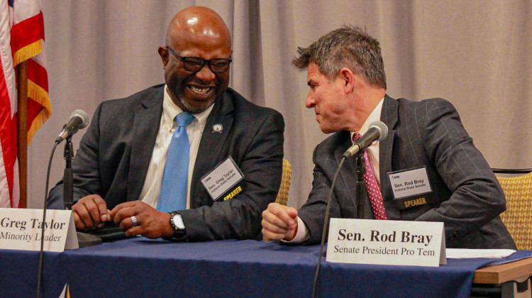 Senate Minority Leader Greg Taylor (D-Indianapolis) and Senate President Pro Tem Rodric Bray (R-Martinsville) talk during a panel discussion hosted by the Indiana Chamber of Commerce on Monday, Nov. 20, 2023.  - Brandon Smith/IPB News