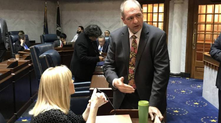 Elections Committee Chair Sen. Greg Walker (R-Columbus) talks with fellow lawmakers ahead of a committee meeting. - Brandon Smith/IPB News